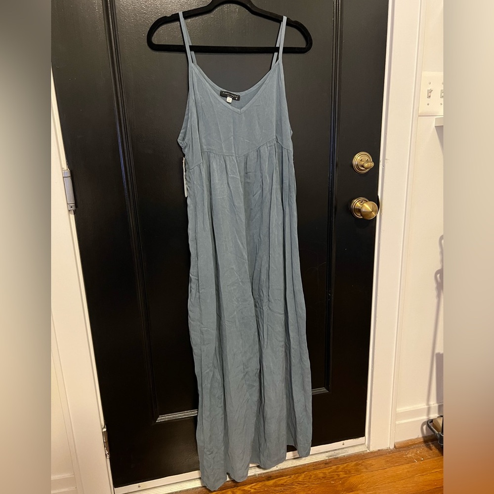 Blue, wide-leg jumpsuit with pockets.
